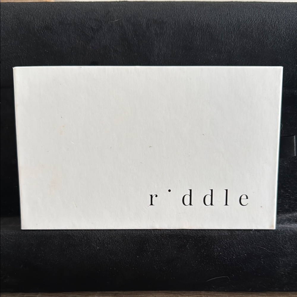 Minimalist White Card with Riddle Text